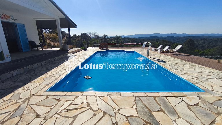 Chácara com 4 dormitórios e lazer completo LT0081